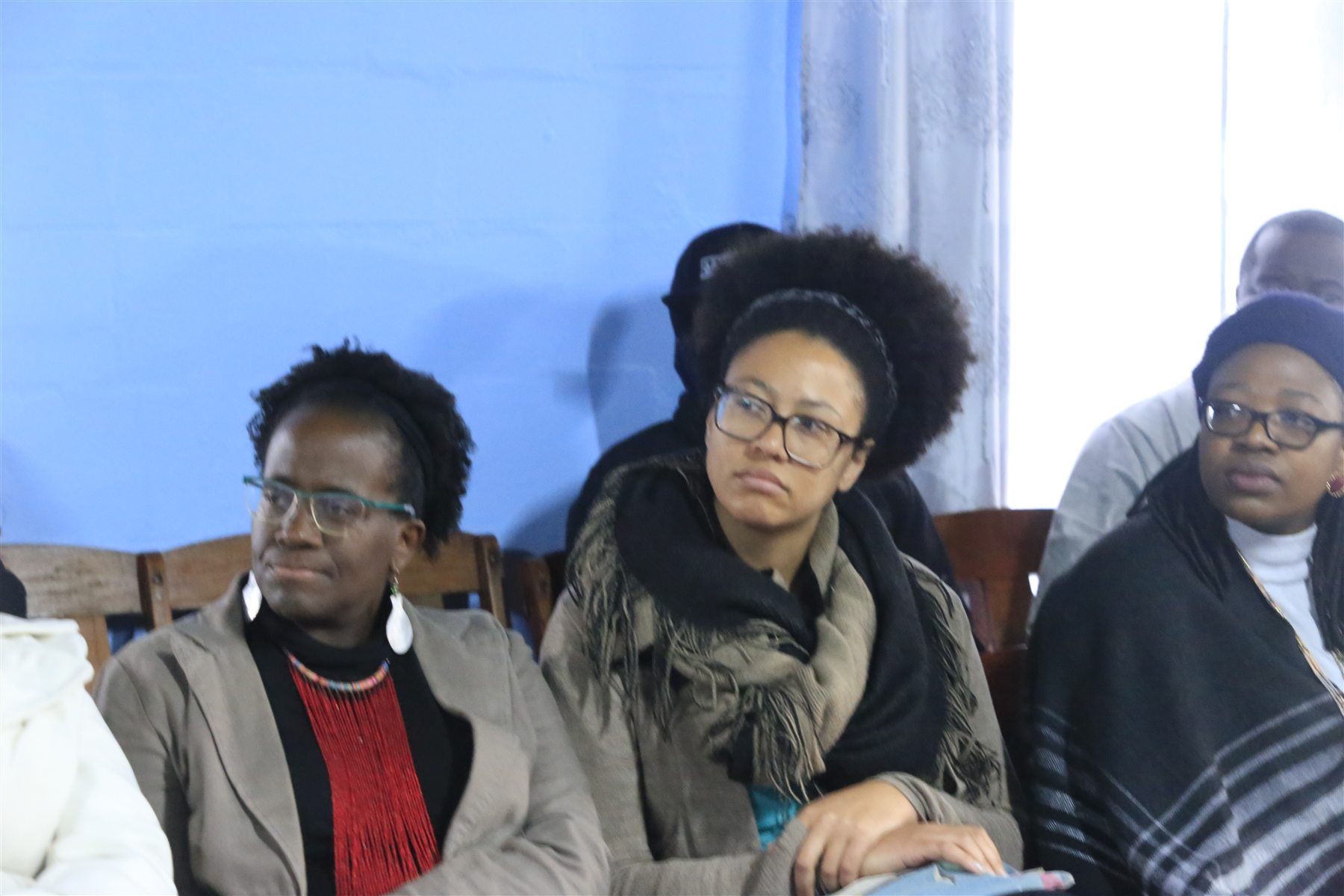 Community members listening together at an eKasi Theologies gathering.