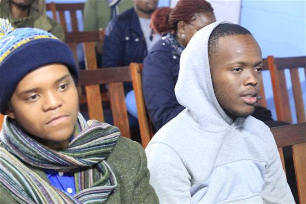 Participants listening together.
